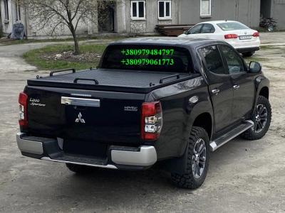    Mitsubishi L200,   200  